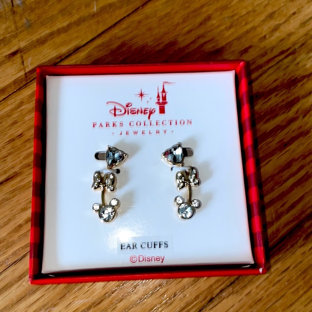 Disney earrings NEW never used
